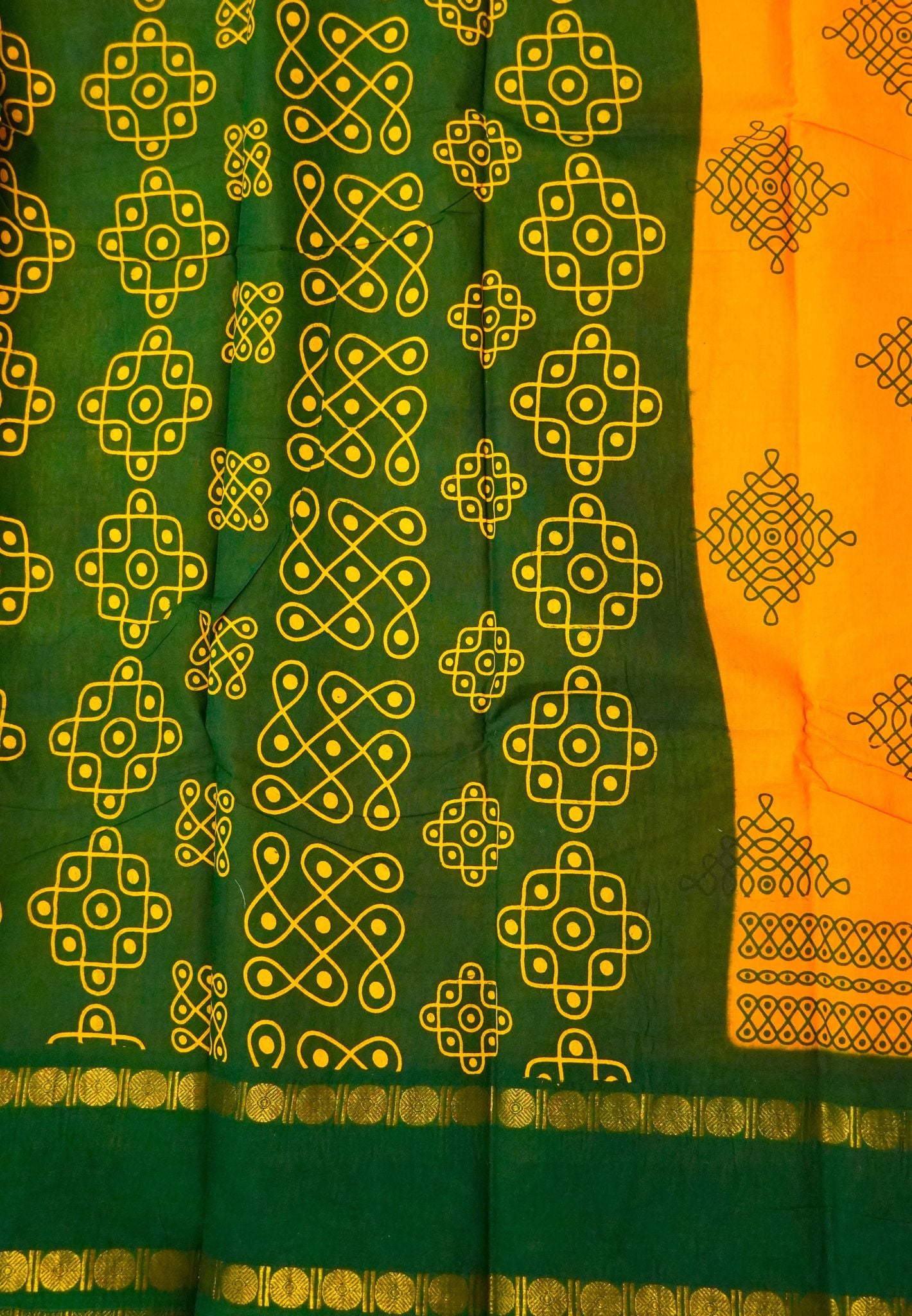 Sungudi Cotton Saree-Tumeric Yellow with Contrast Retapet Border in Kolam Pattern