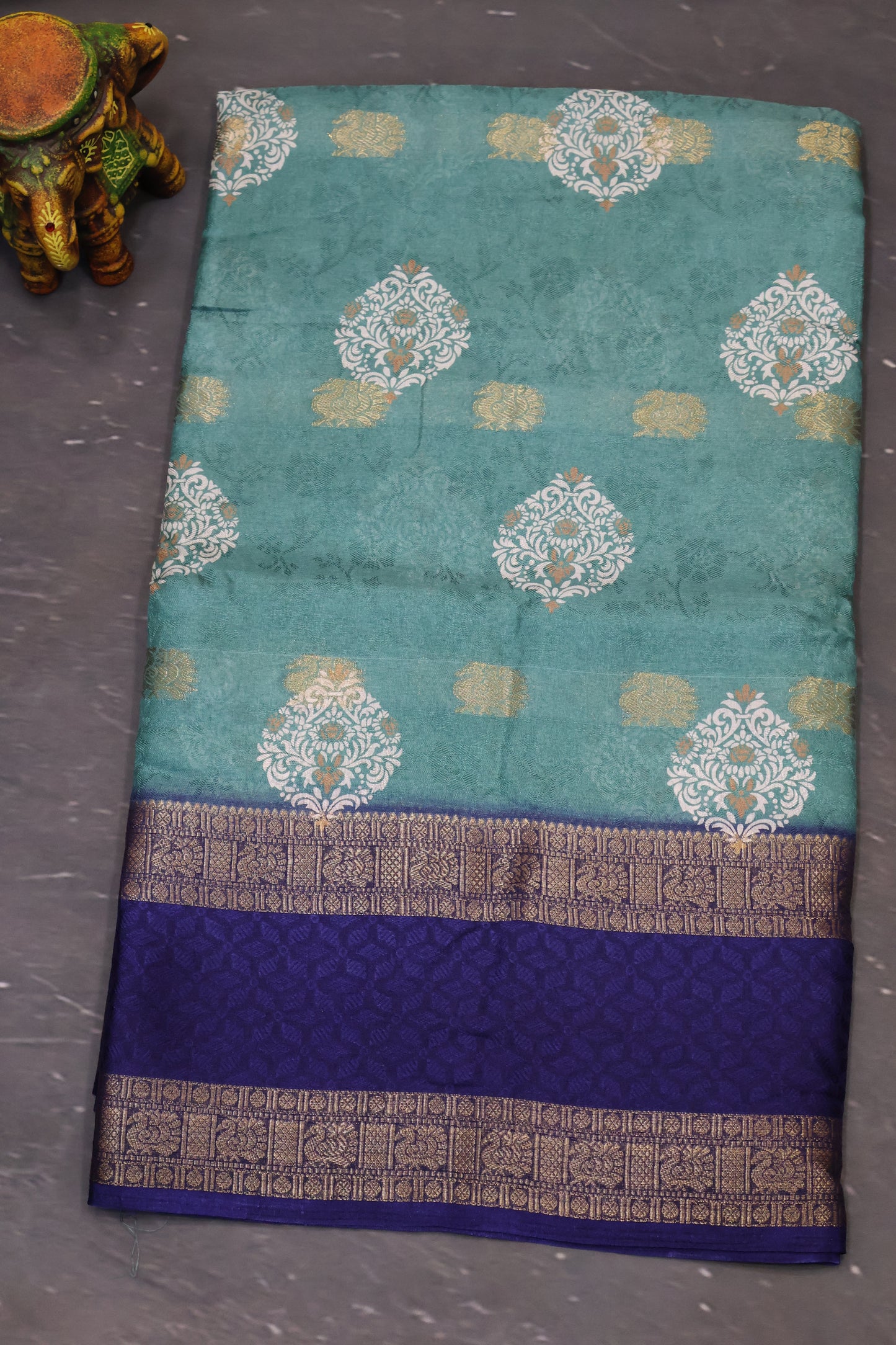 Semi Dola Silk Saree-Metalic Green-Blue Print Dark Double Border