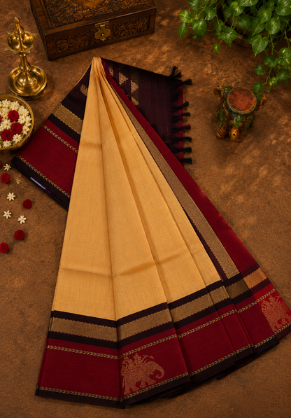 Pure Silk Cotton Saree – Sandal with Maroon Traditional Yali Border