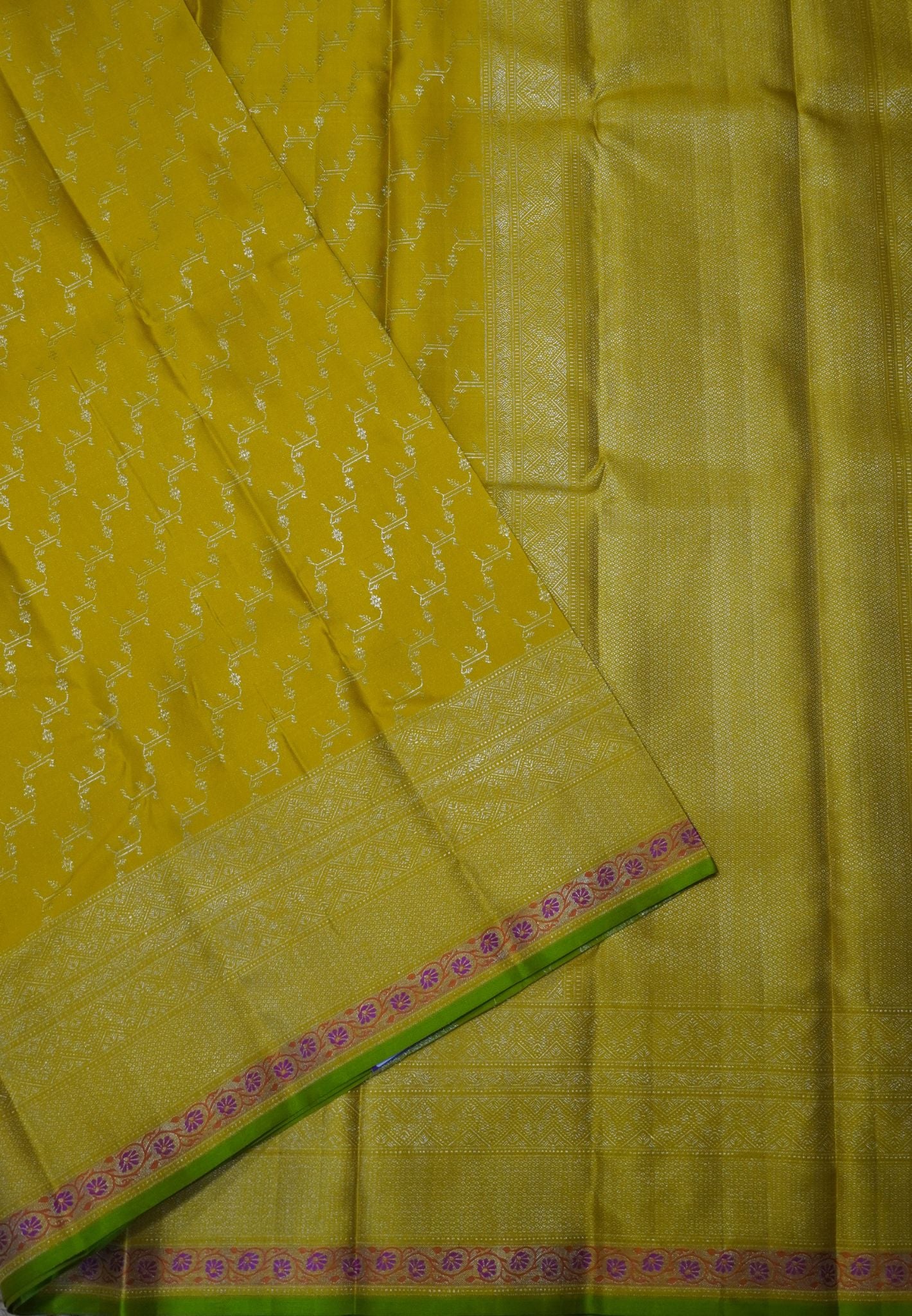 Pure Kanchipuram Silk-Yellow with Silver Zari and Floral Border
