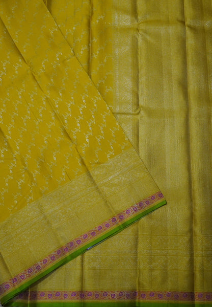 Pure Kanchipuram Silk-Yellow with Silver Zari and Floral Border