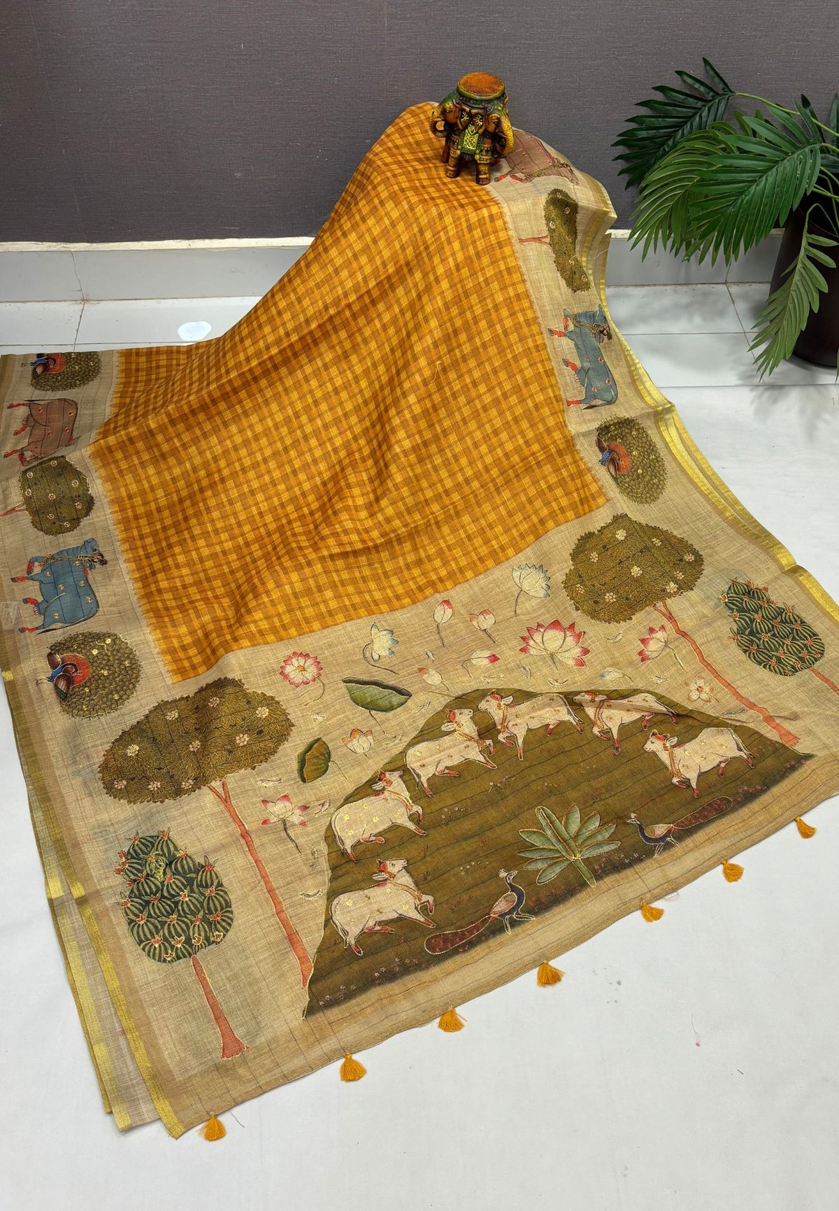 Tissue Linen Saree-Mustard in Pichwai Cow & Peacock Motif Border