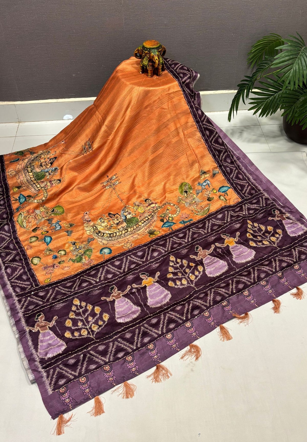 Dola Saree-Pale Orange In Figurative Tribal Motif Border