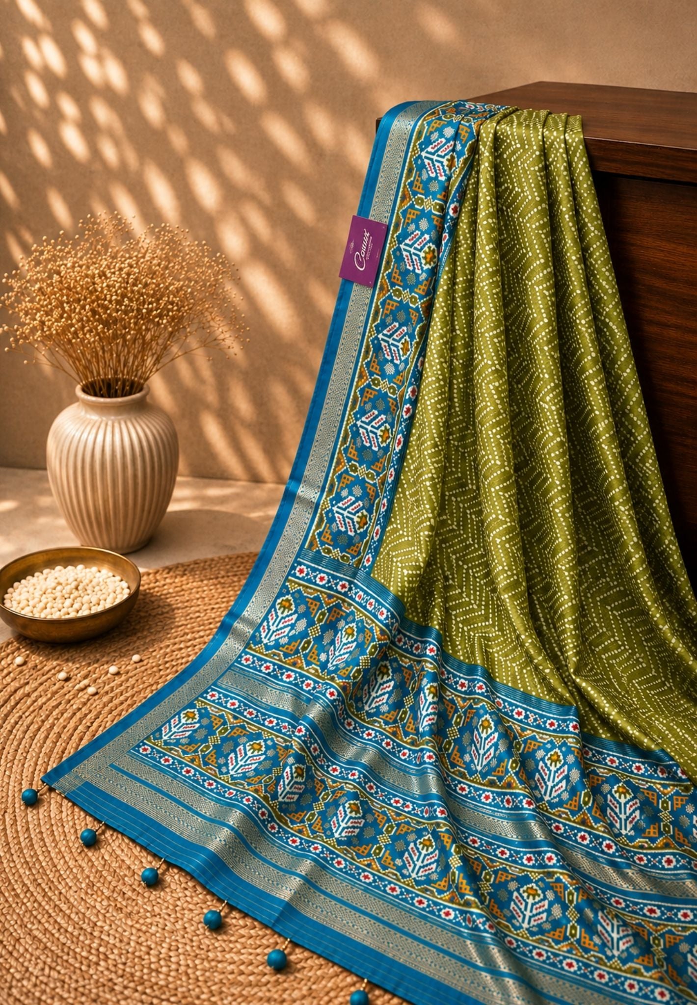 Pattola Saree-Green with Contrast Blue Border
