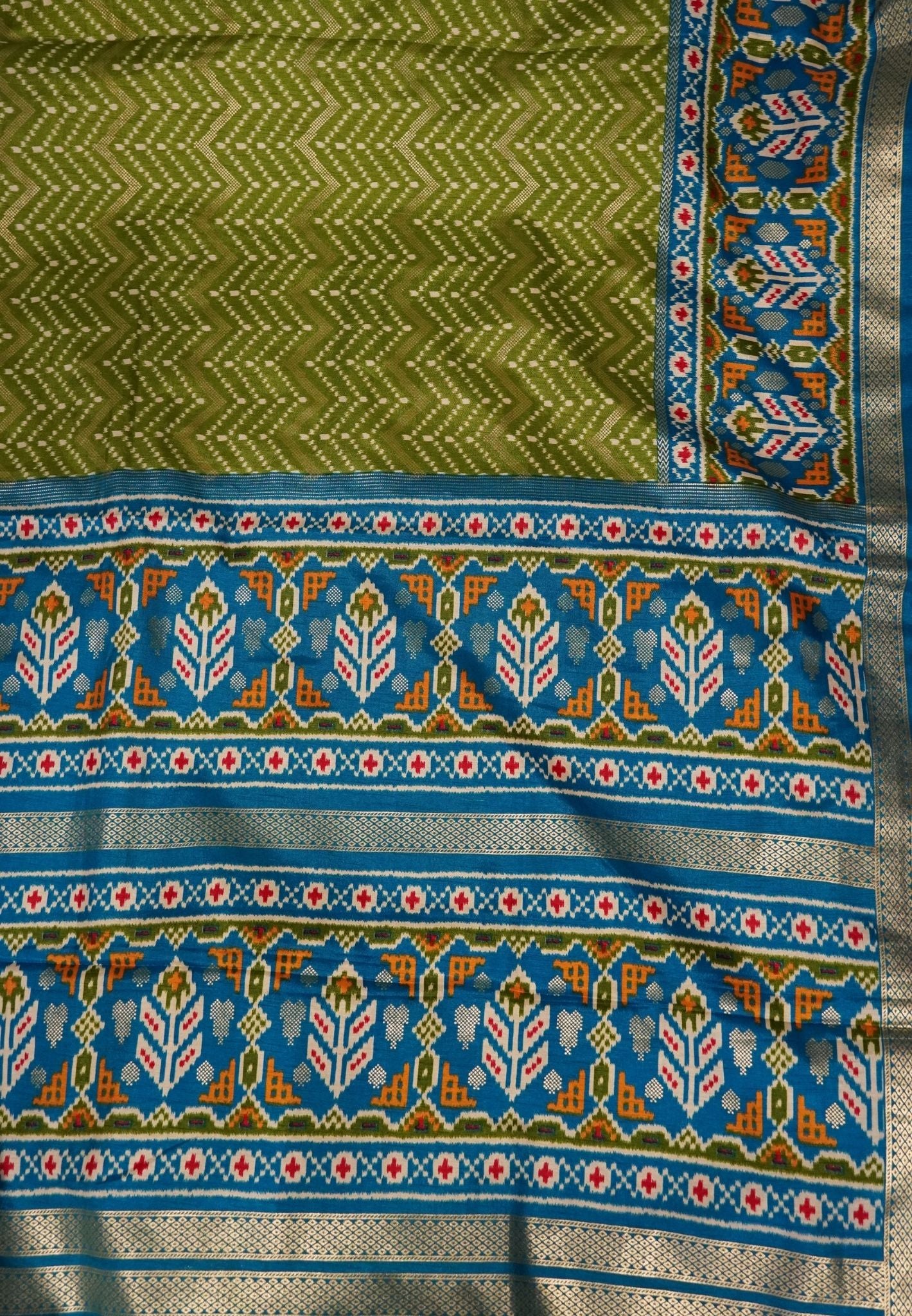 Pattola Saree-Green with Contrast Blue Border