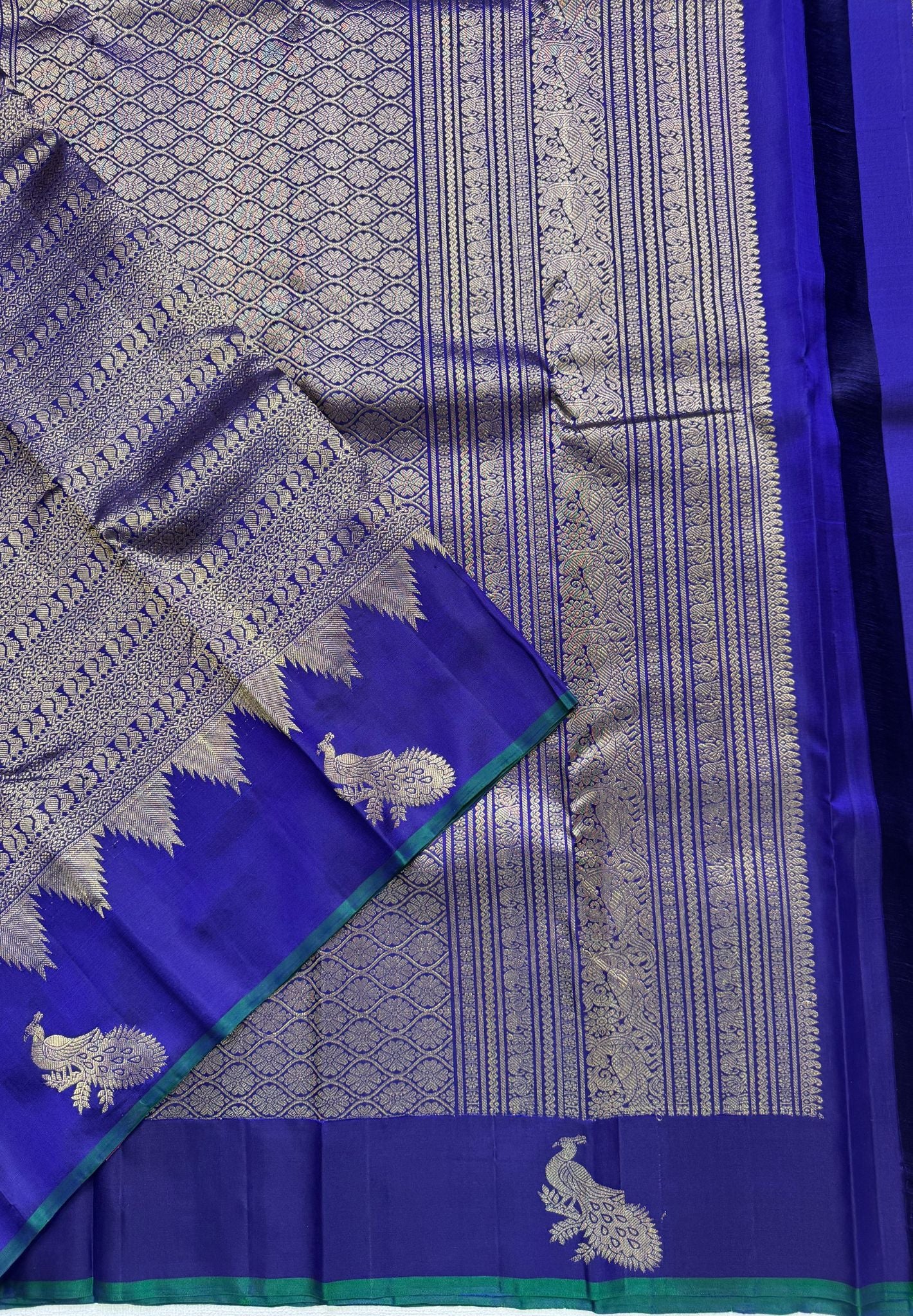 Pure Kanchipuram Silk Saree – Ink Blue with Silver Zari Peacock Motifs