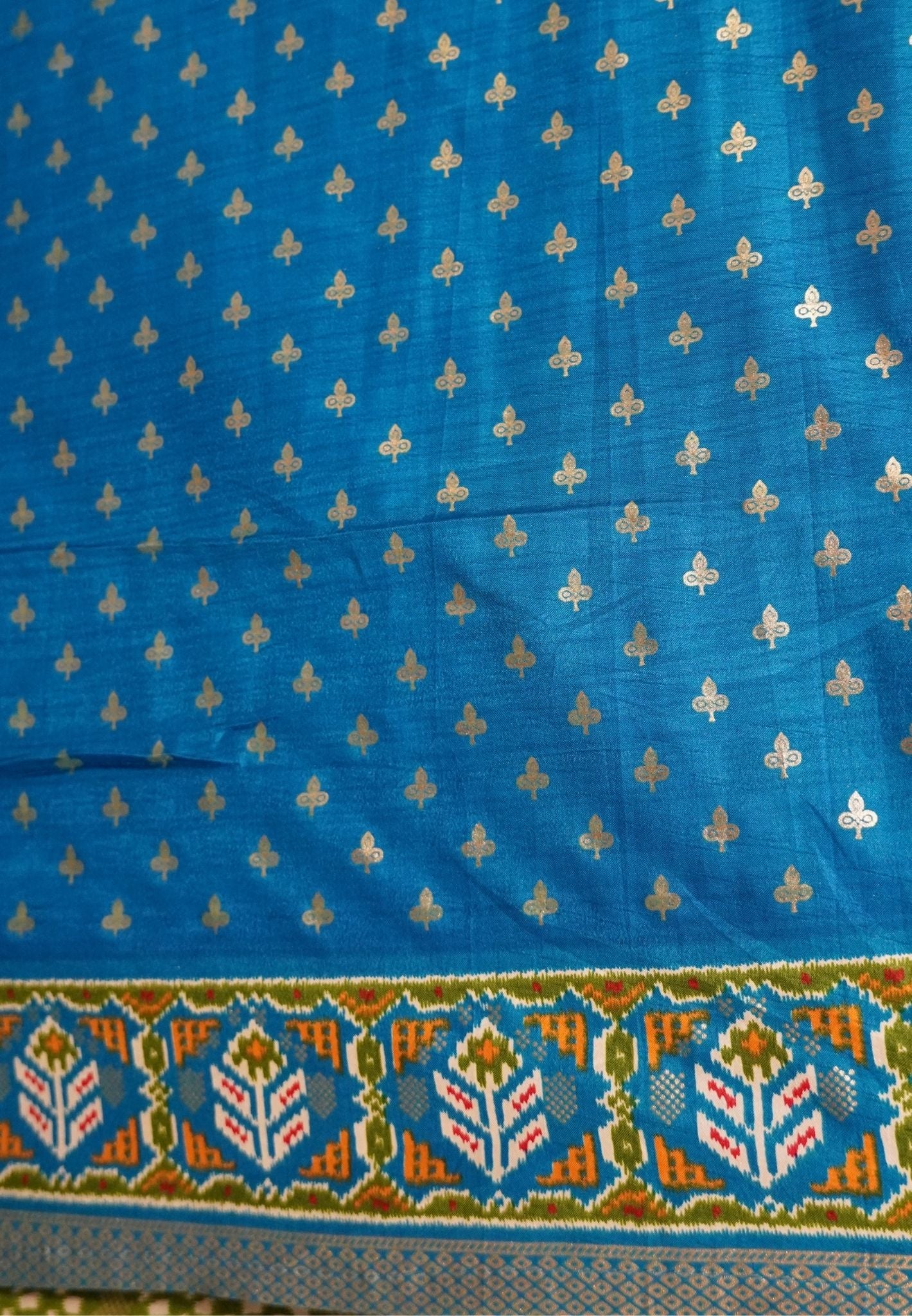Pattola Saree-Green with Contrast Blue Border