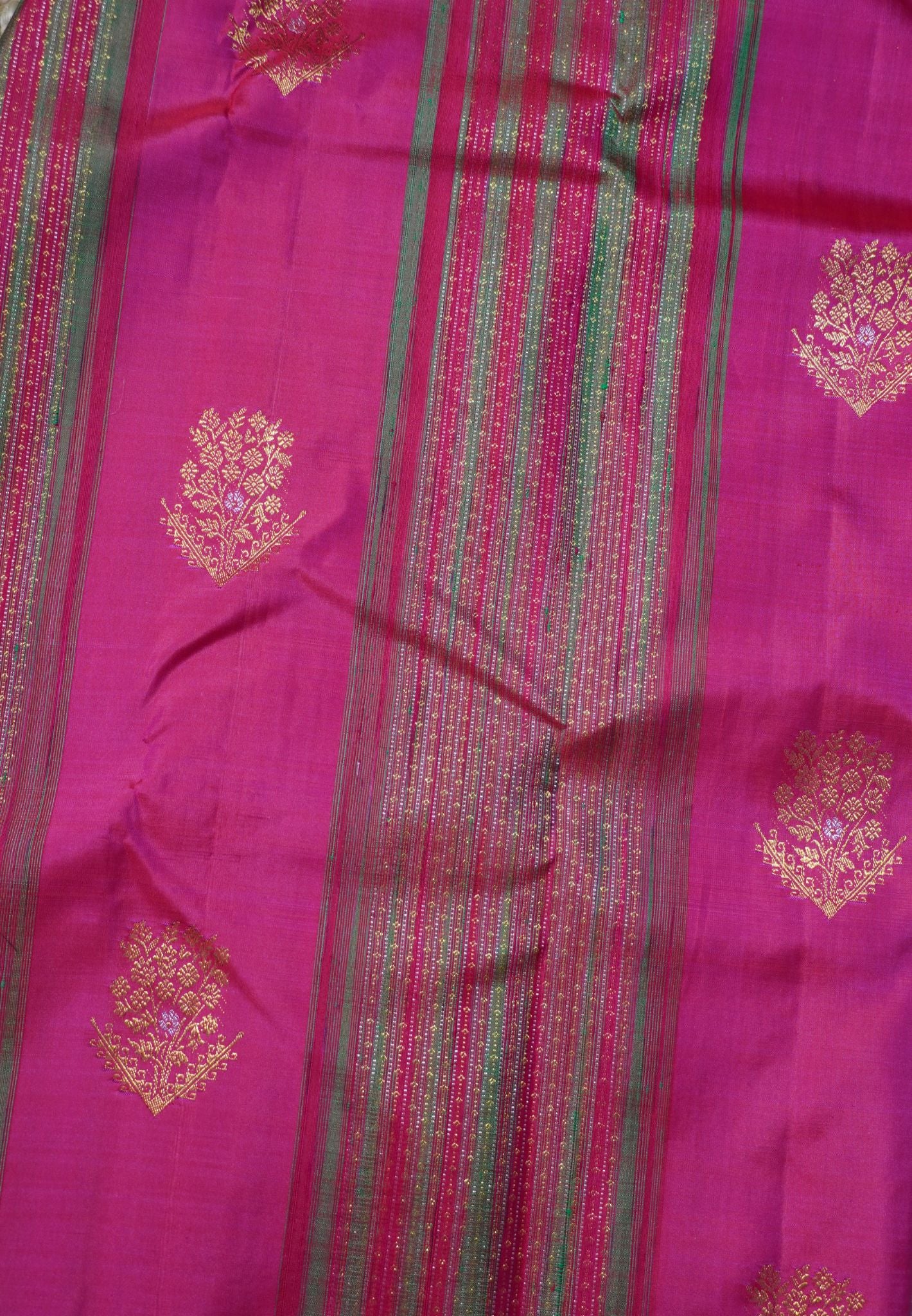 Pure Kanchipuram Silk Saree-Rani Pink with Floral Butta and Zari Vertical Stripes