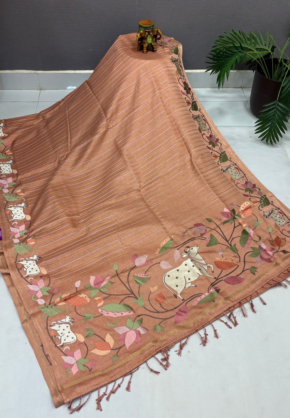 Tussar Saree-Pale Orange with Zari Stripes in Pichwai Embroidery Border