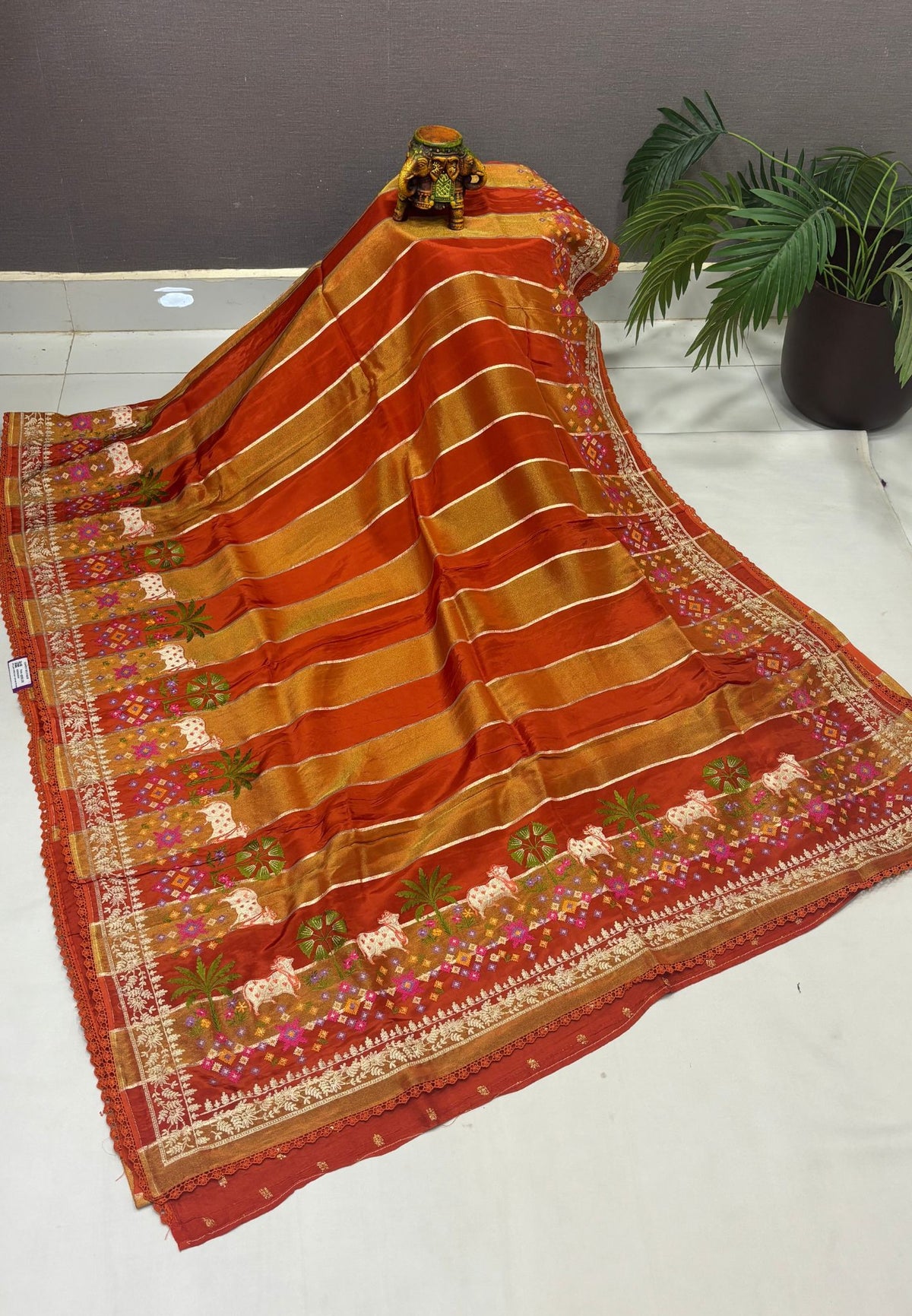 Satin Crepe Saree-Rust Orange In Komatha Floral Border