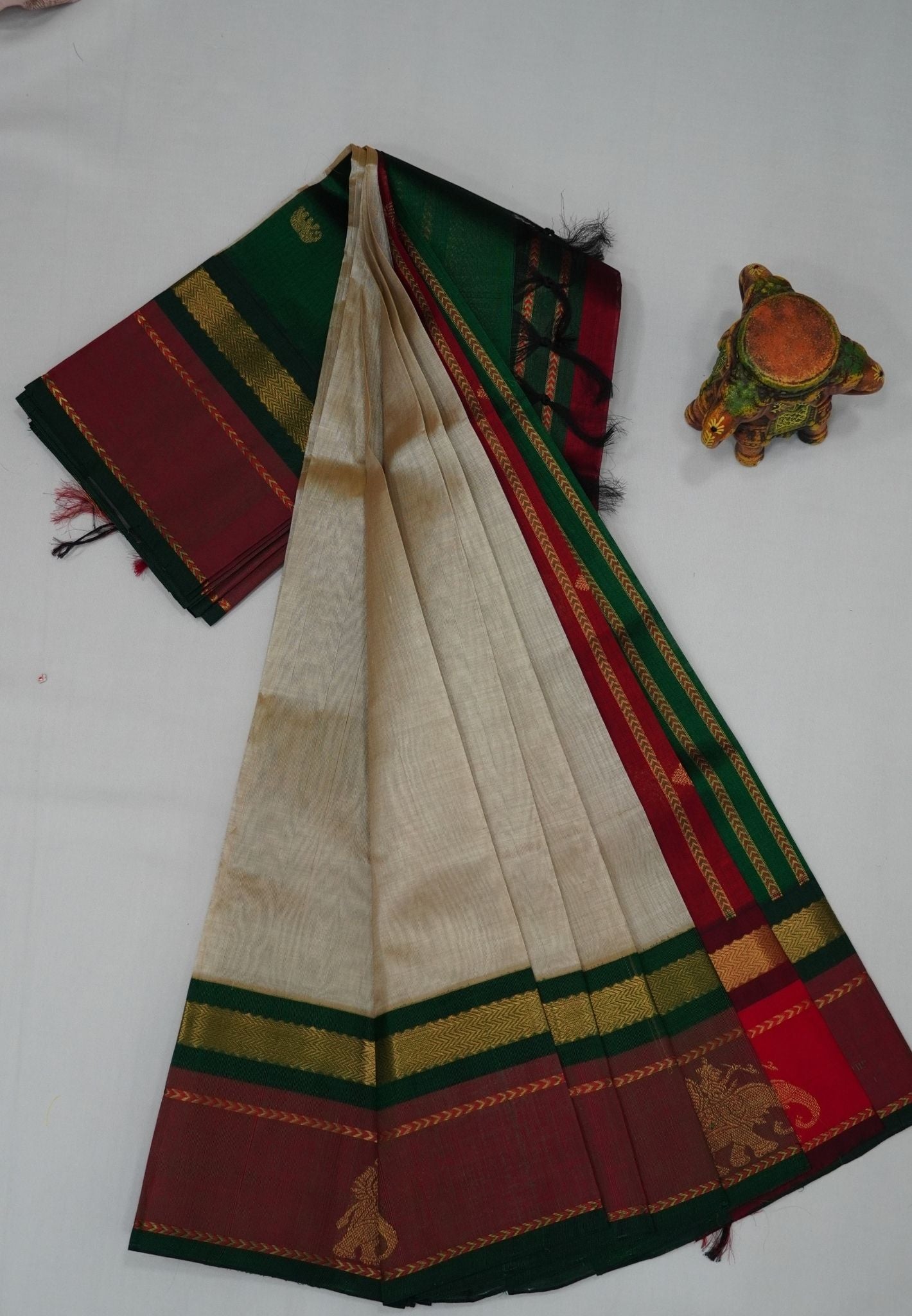 Pure Silk Cotton Saree – Cream with Green Traditional Yali Border
