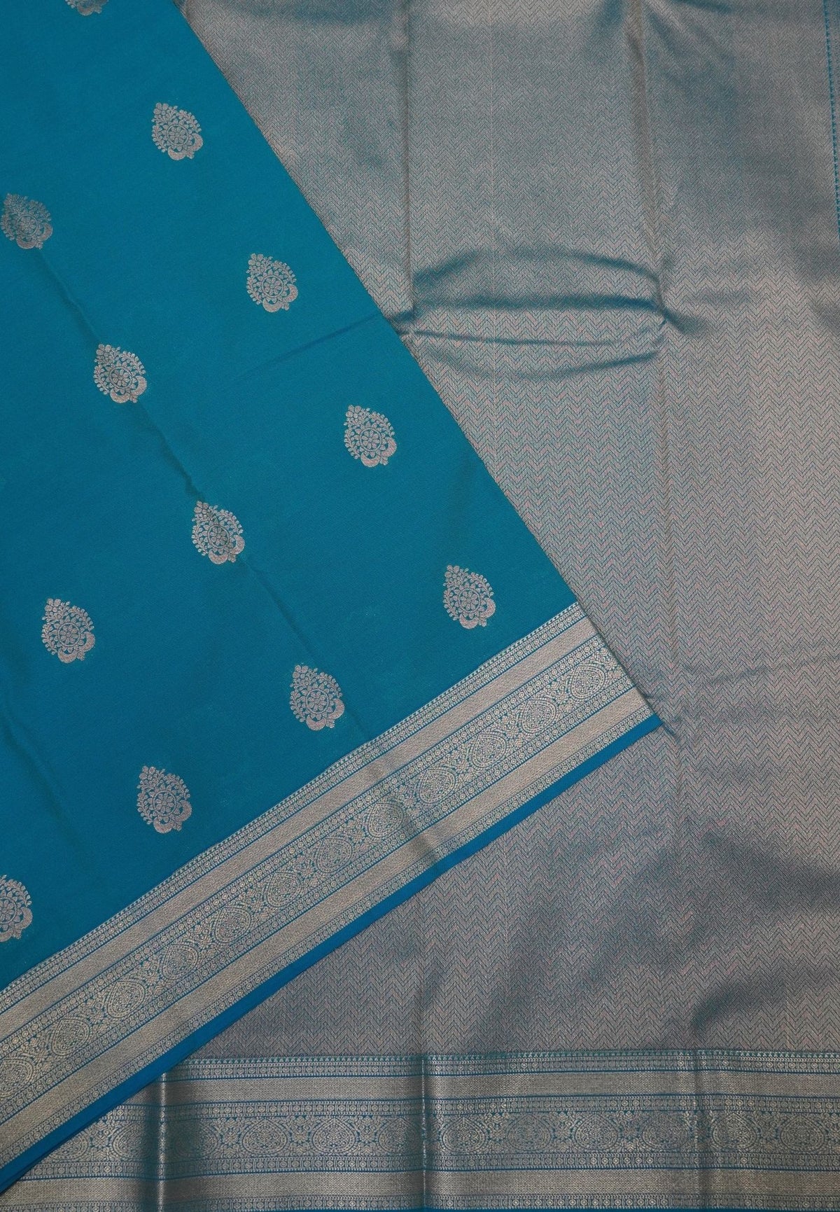 Budget Kanchipuram Saree-Sky Blue In Paisley Jaal Zari Border
