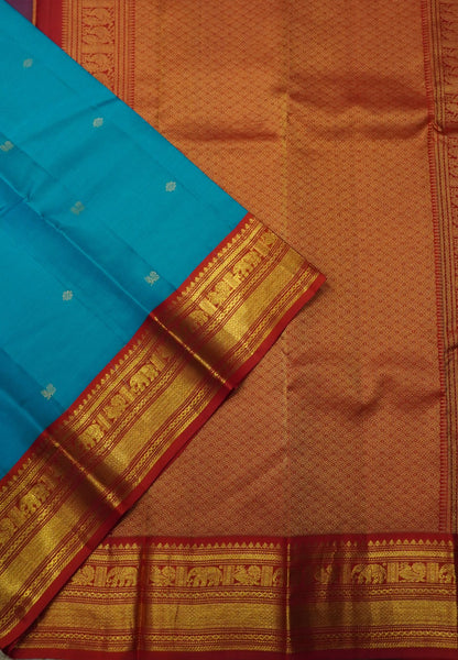 Pure Korvai Kanchipuram Silk Saree-Turquoise blue-Orange with peacock butta