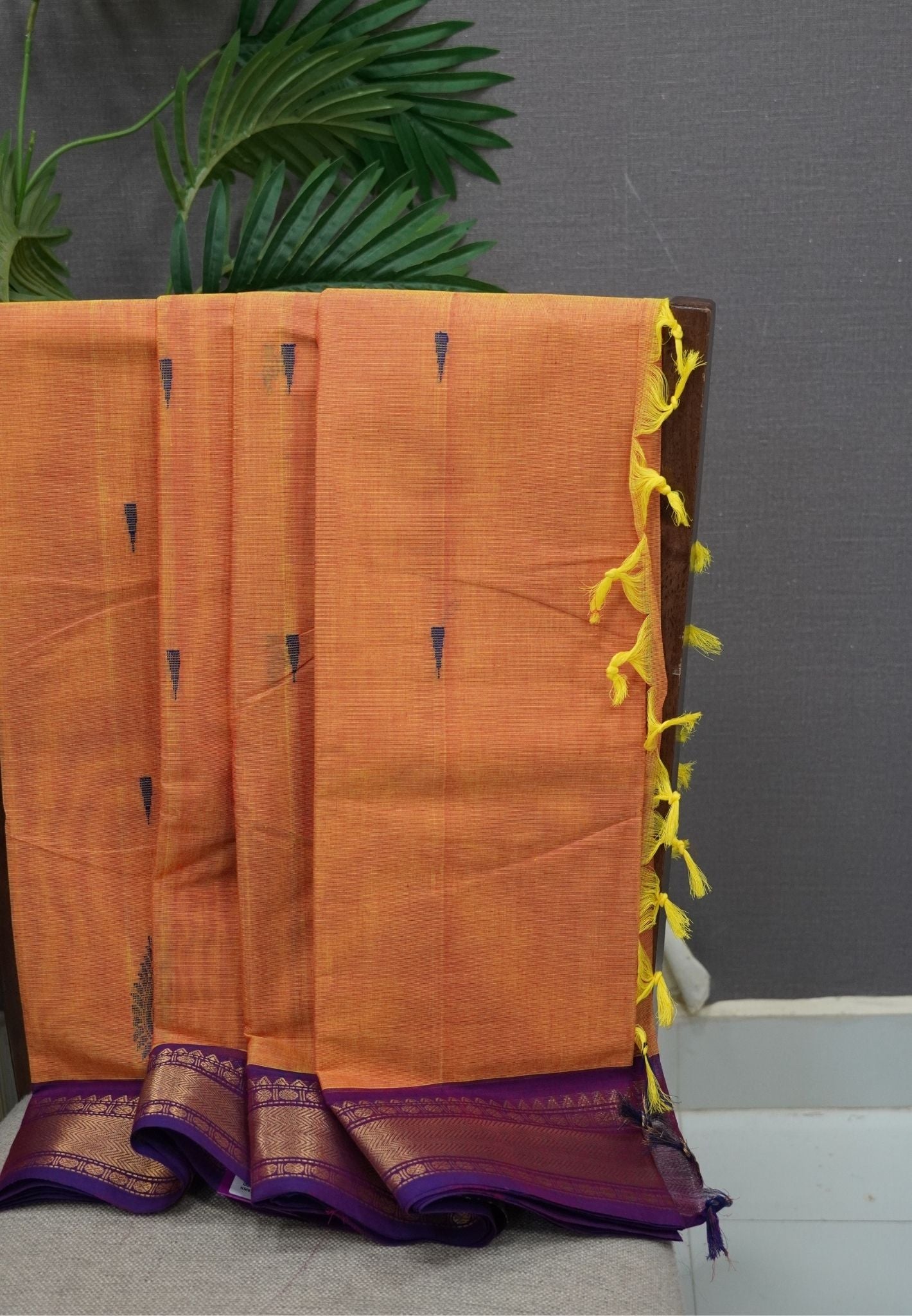 Chettinadu Cotton Saree-Yellowish Orange with Royal Purple Zari Border & Traditional Buttas