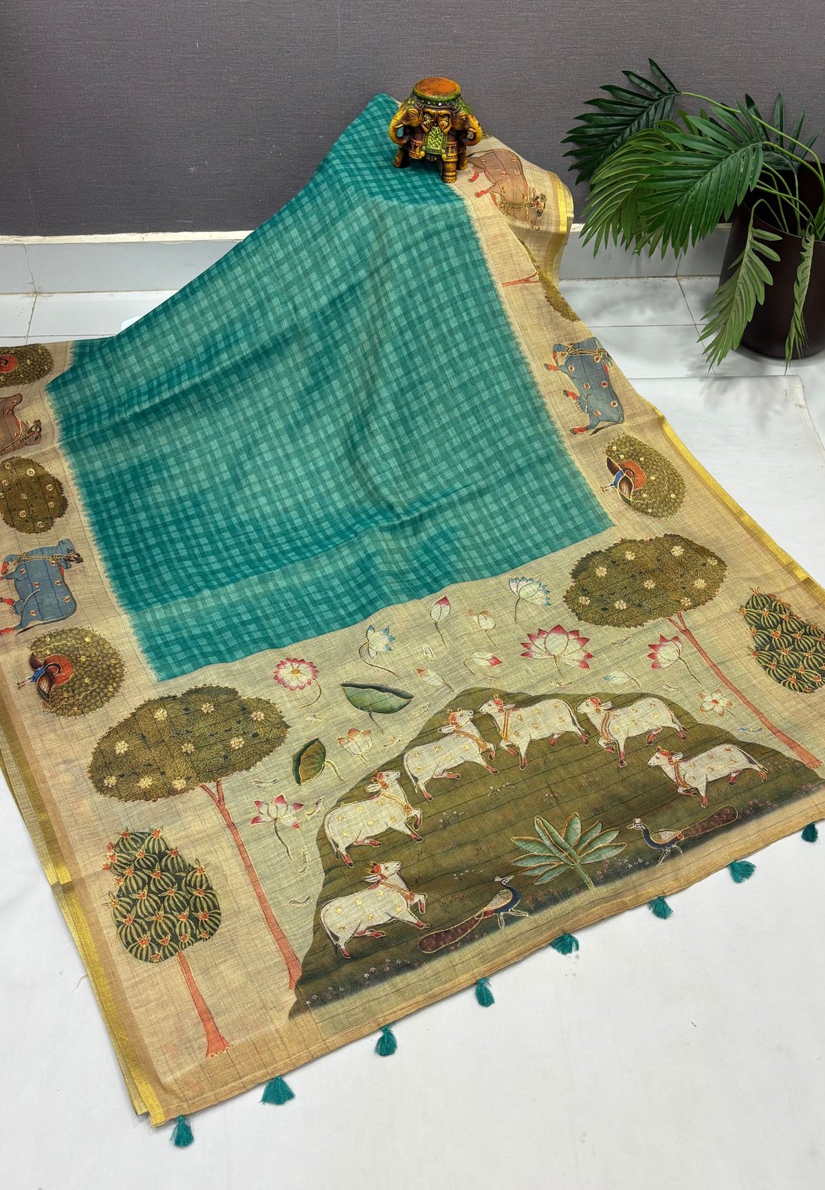 Tissue Linen Saree-Sea Green in Pichwai Cow & Peacock Motif Border